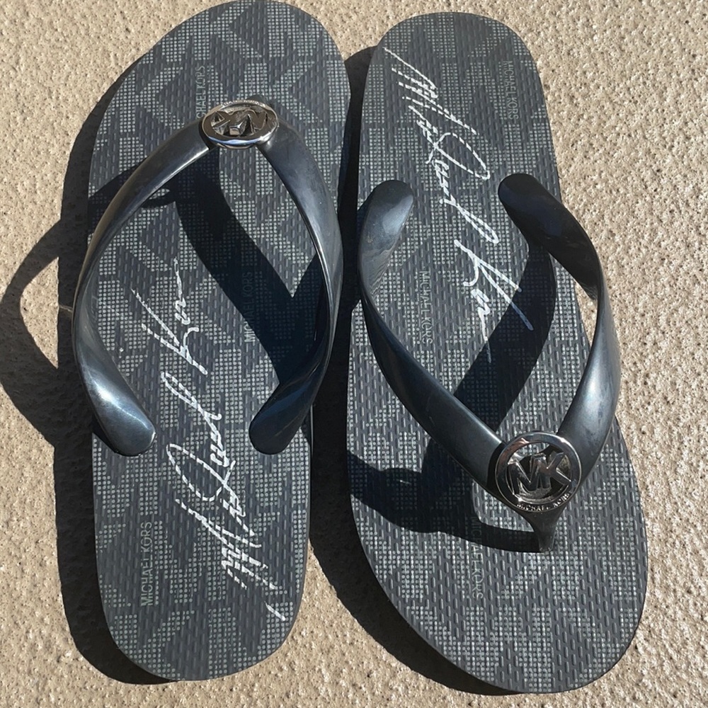 Michael Kors Flip Flops! Size 7. Never worn!